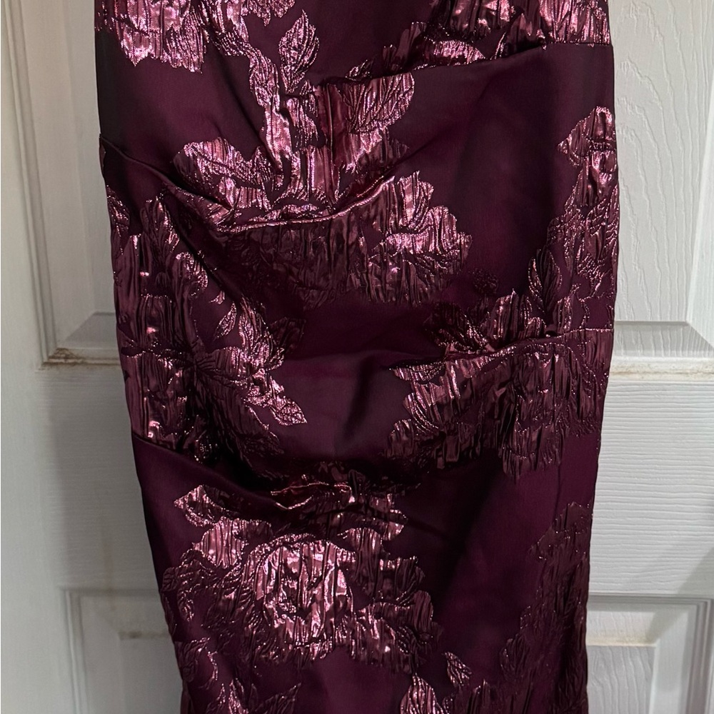 Elegant Aidan Mattox Maroon Dress with textured accents.